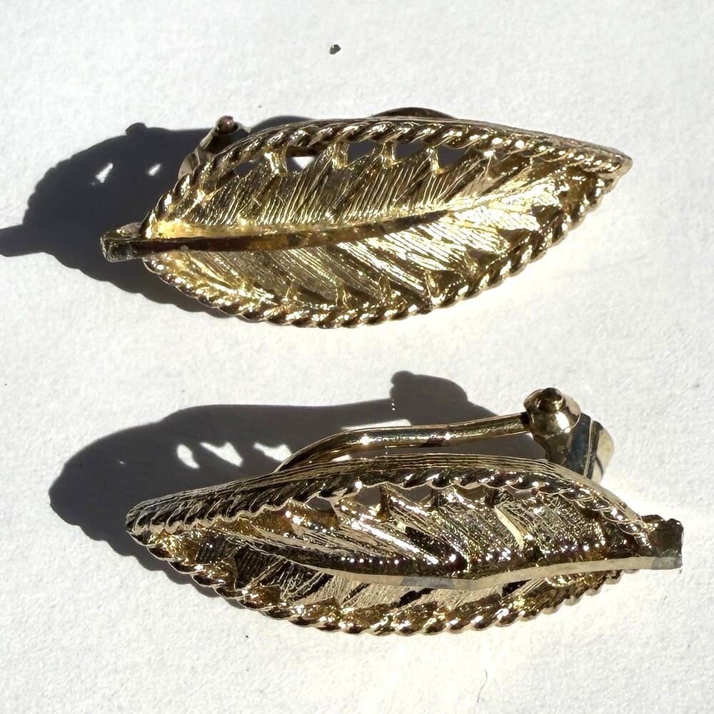BSK‎ vintage leaf clip‑on earrings – gold tone textured, signed